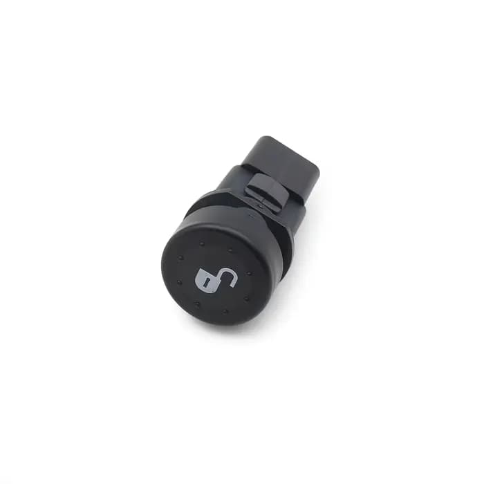 Bouton d'ouverture de selle pour moto