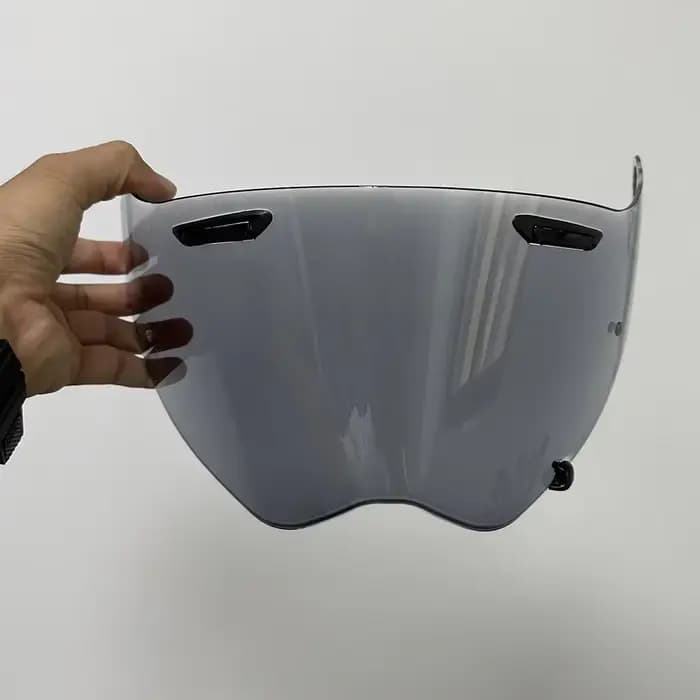 Visière automatique pour casque de moto