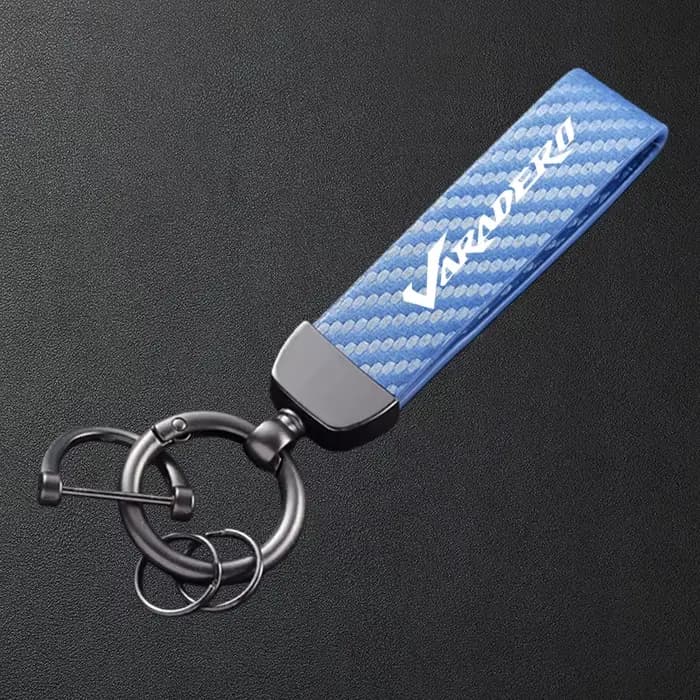 Porte-clés de moto en cuir texturé en fibre de carbone