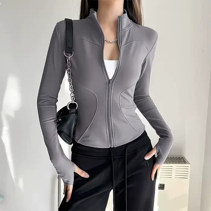 Veste de sport ajustée pour femme, séchage rapide, manches longues, taille cintrée, idéale pour le yoga, la course et le fitness en extérieur – Collection Printemps-Automne