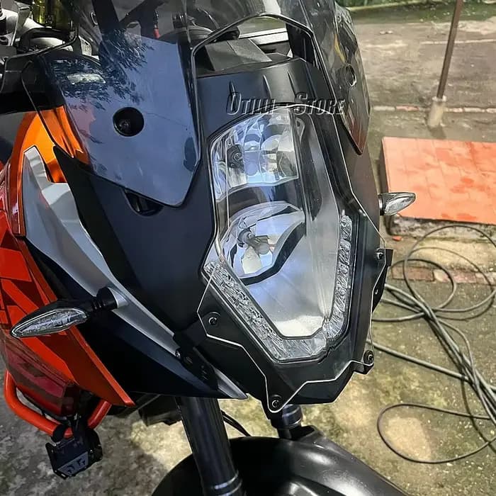 Couvercle de protection des phares de moto